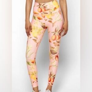 NWOT Beyond Yoga leggings in Fruit Print/Peach size Small